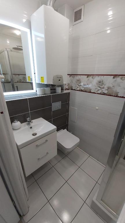 Kúpeľňa v ubytovaní Apartament w Centrum