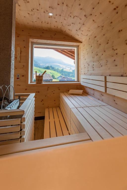 Postel nebo postele na pokoji v ubytování Roggenstock Lodge
