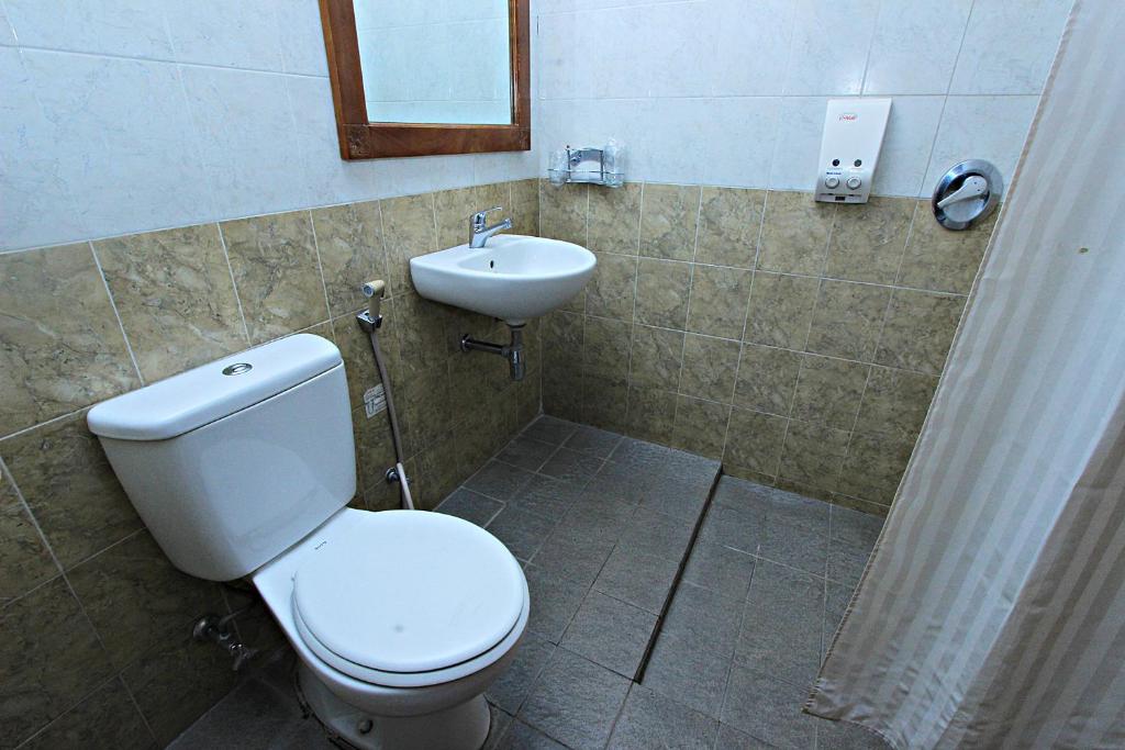 Koupelna v ubytování Griya Sentana Hotel
