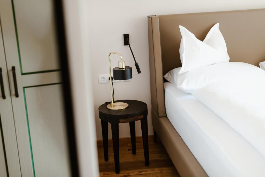 Posteľ alebo postele v izbe v ubytovaní Ansitz am Eck by Hotel Pernhof