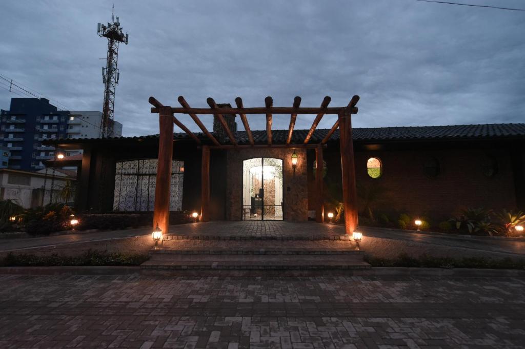 a entrance to a building with a wooden arch at Ivlas Boutique Hotel in Santa Maria