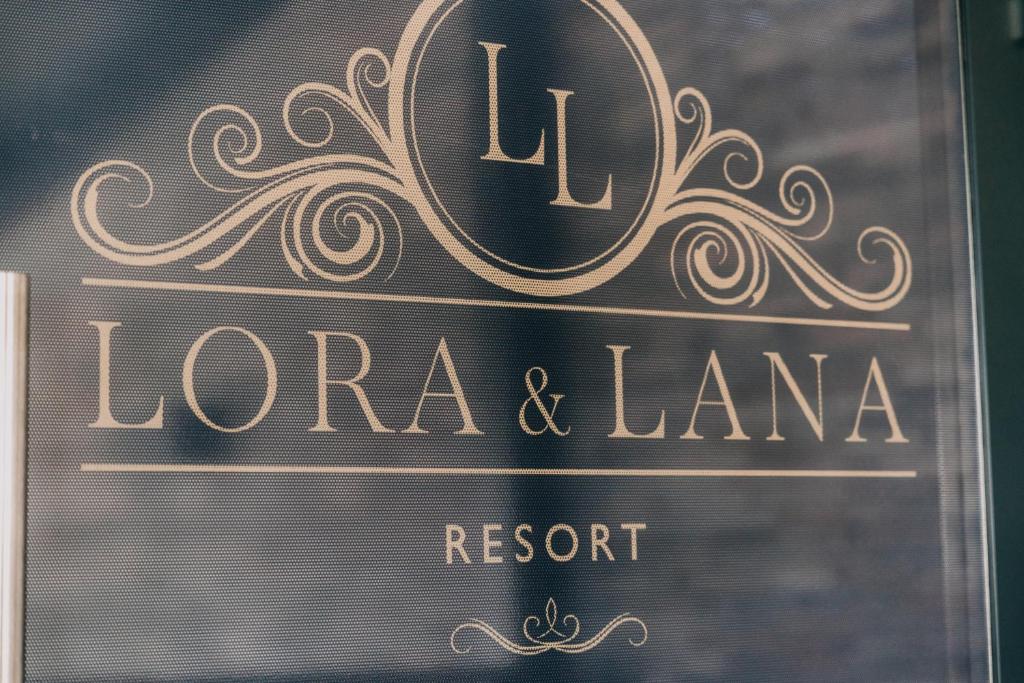 Certifikát, hodnocení, plakát nebo jiný dokument vystavený v ubytování Lora & Lana Resort