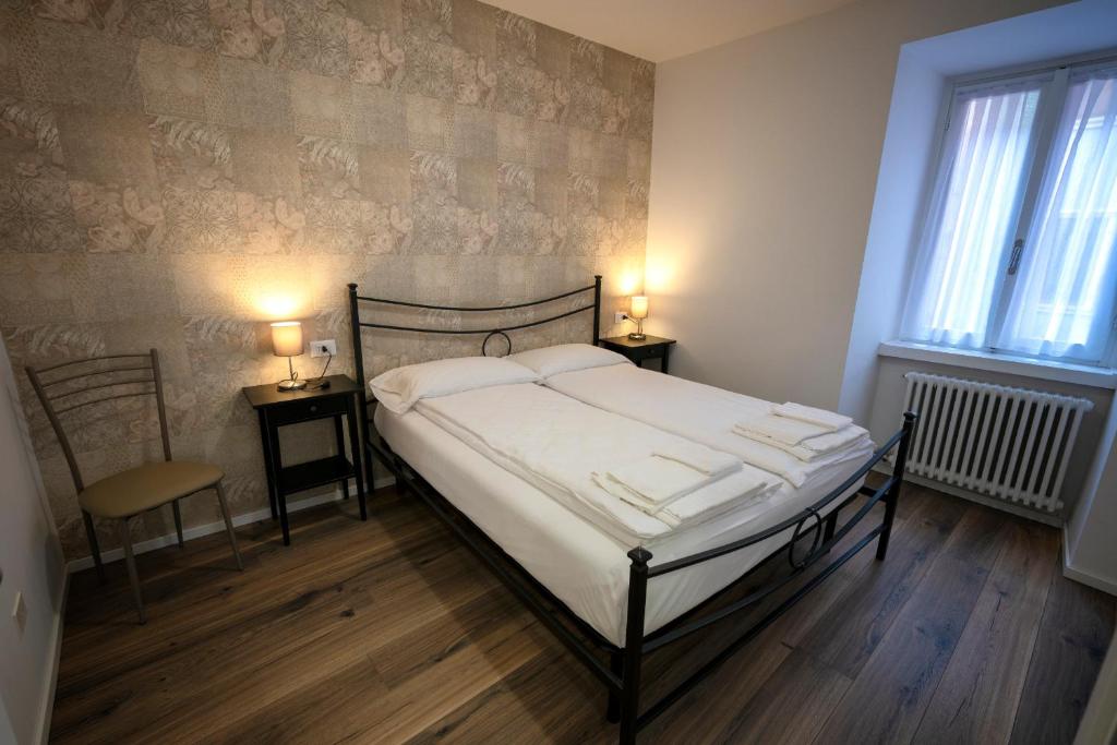 Posteľ alebo postele v izbe v ubytovaní Appartamento L’Anzolim