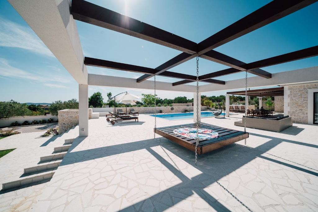Patio alebo iná vonkajšia časť ubytovania Villa Olivetum