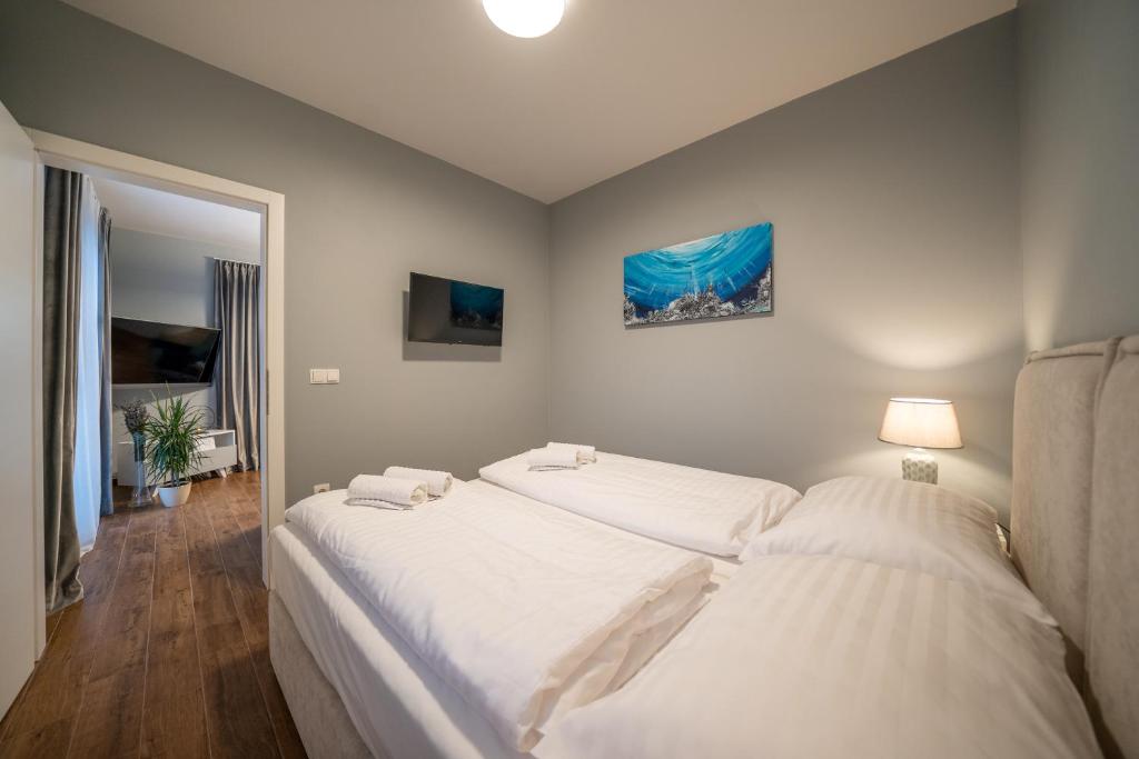 Posteľ alebo postele v izbe v ubytovaní Villa Olivetum