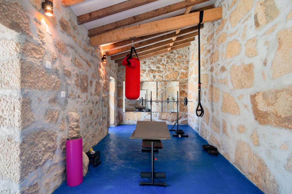 Uma rea de estar em Casa de Lagarinhos JACUZZI SPA JOGOS GYM - SERRA DA ESTRELA - SEIA - GOUVEIA