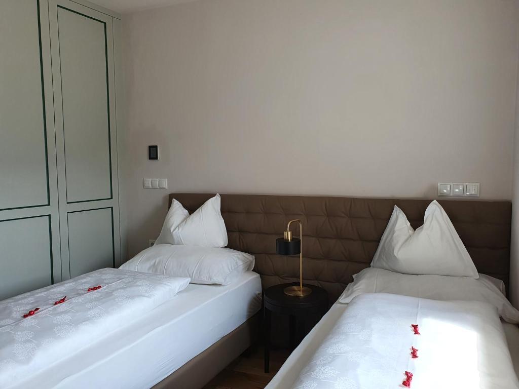 Posteľ alebo postele v izbe v ubytovaní Ansitz am Eck by Hotel Pernhof