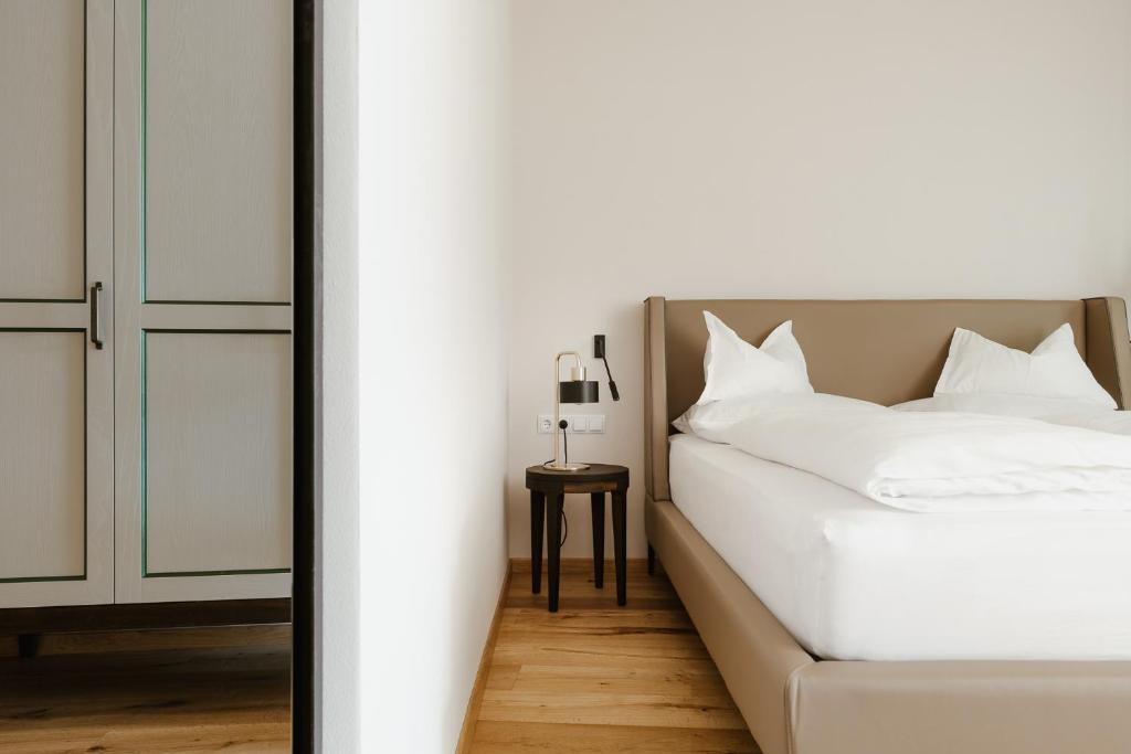 Posteľ alebo postele v izbe v ubytovaní Ansitz am Eck by Hotel Pernhof