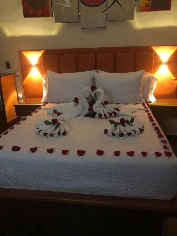 Postel nebo postele na pokoji v ubytování ATENEA SPA Hotel