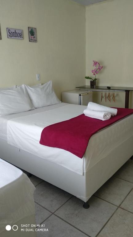 Cama ou camas em um quarto em Pousada Nordestina