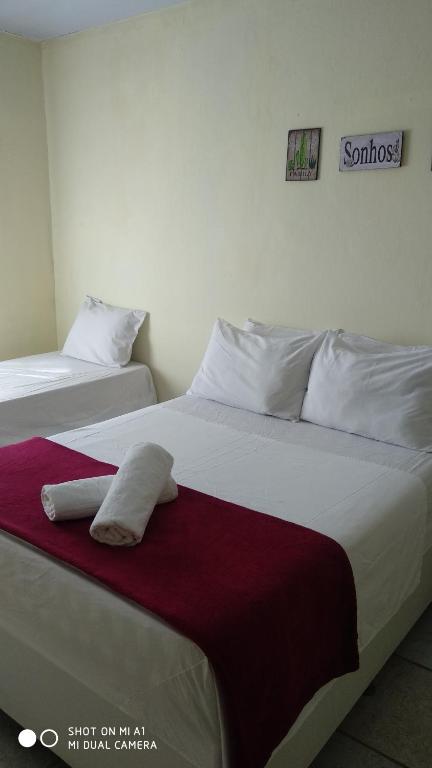 Cama ou camas em um quarto em Pousada Nordestina