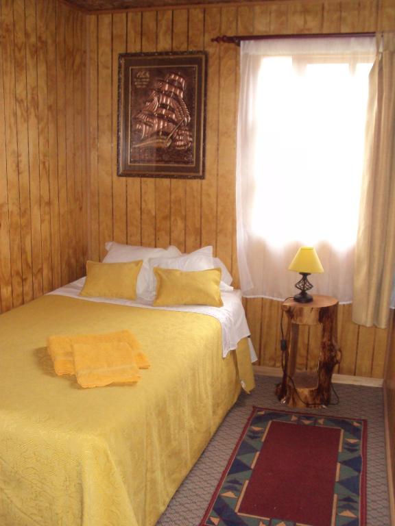 Postel nebo postele na pokoji v ubytování Hosteria Rayen