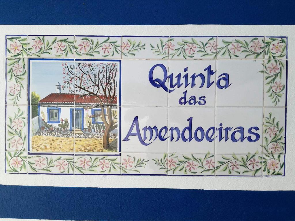 a sign for a house that says antigua does endodontos at Hakuna matata in Benagil