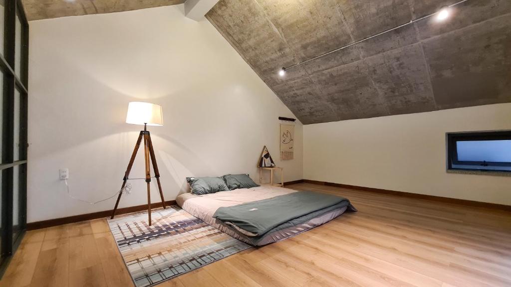 Postel nebo postele na pokoji v ubytování MyFa House