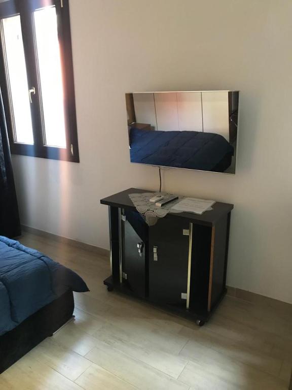 Posteľ alebo postele v izbe v ubytovaní Blu Suite