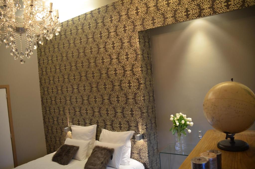 Postel nebo postele na pokoji v ubytování B&B N°5