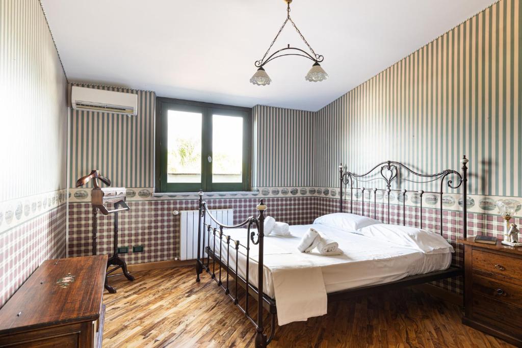 Łóżko lub łóżka w pokoju w obiekcie Solemar Sicilia - Villa Anastasia