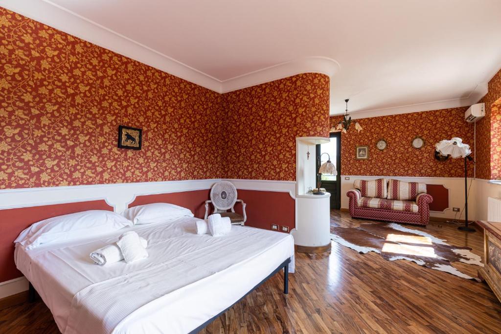 Łóżko lub łóżka w pokoju w obiekcie Solemar Sicilia - Villa Anastasia