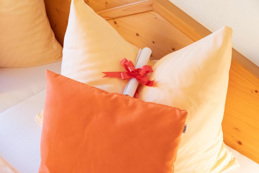 Postel nebo postele na pokoji v ubytování Hotel Garni Oasis Loipersdorf