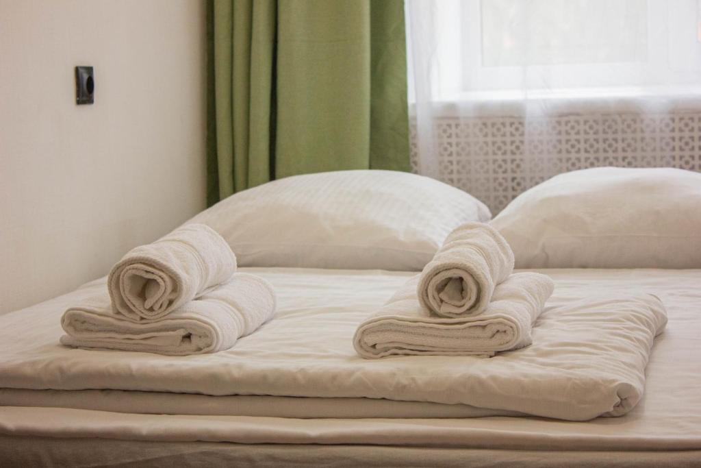 Krevet ili kreveti u jedinici u objektu Simple Seasons Rooms - Самозаселение