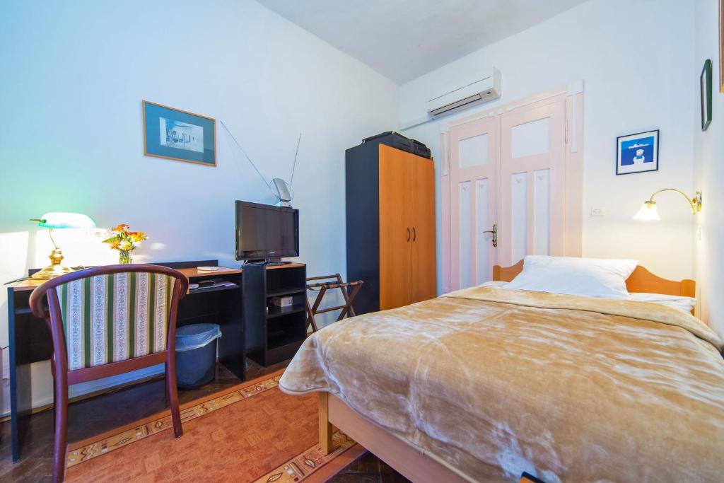 Кровать или кровати в номере B&B Sesame Inn