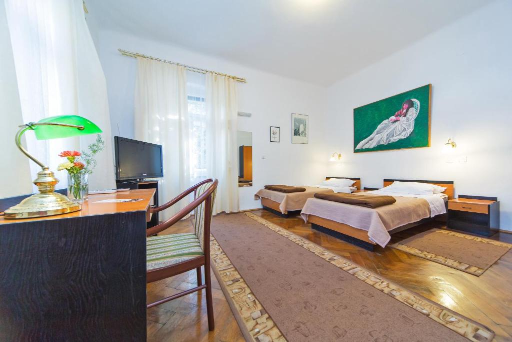Кровать или кровати в номере B&B Sesame Inn
