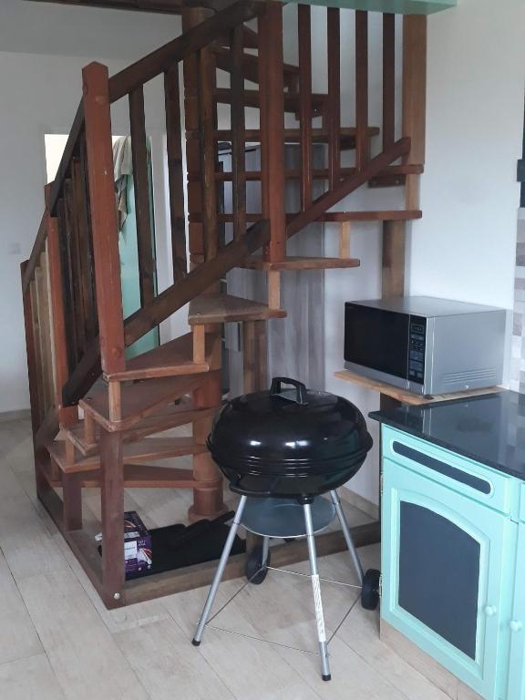 Kuchyň nebo kuchyňský kout v ubytování La case à coco