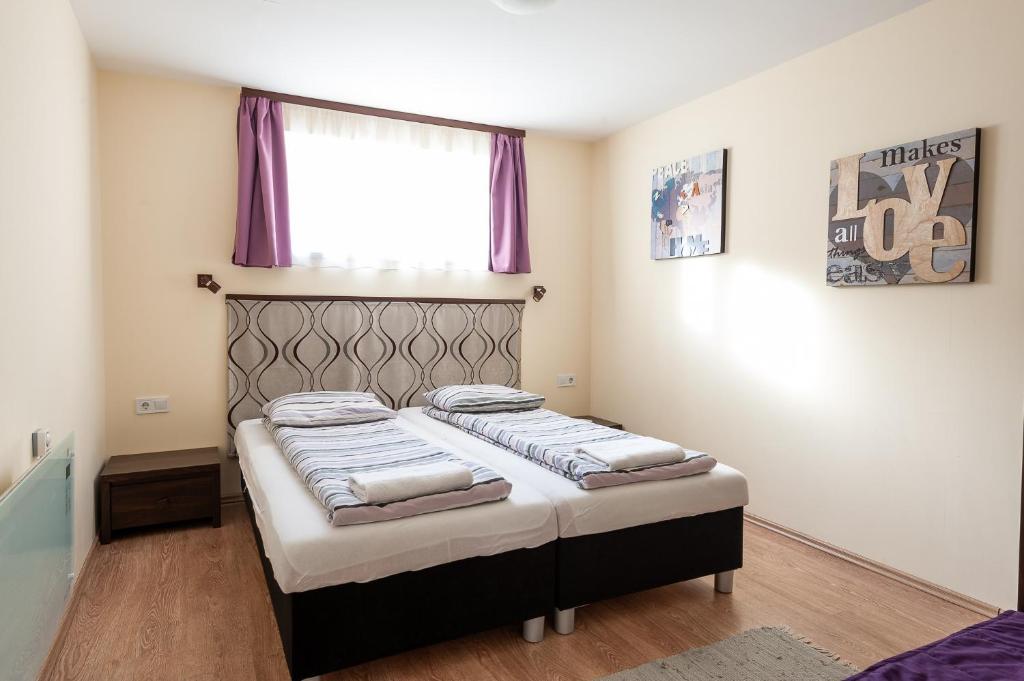 Postel nebo postele na pokoji v ubytování Haus Alpenblick Mölltal