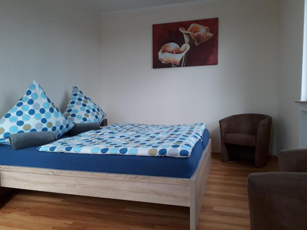 Postel nebo postele na pokoji v ubytování Ferienwohnung SimBlick