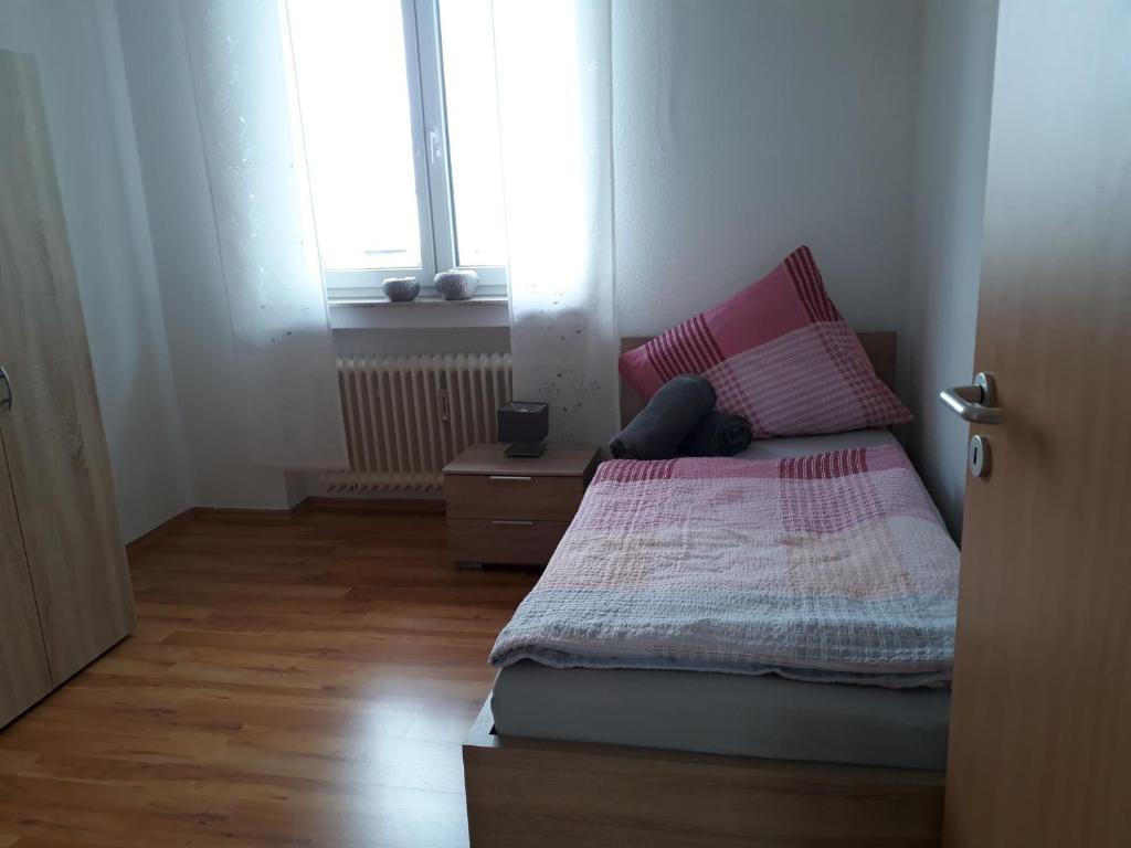 Postel nebo postele na pokoji v ubytování Ferienwohnung SimBlick