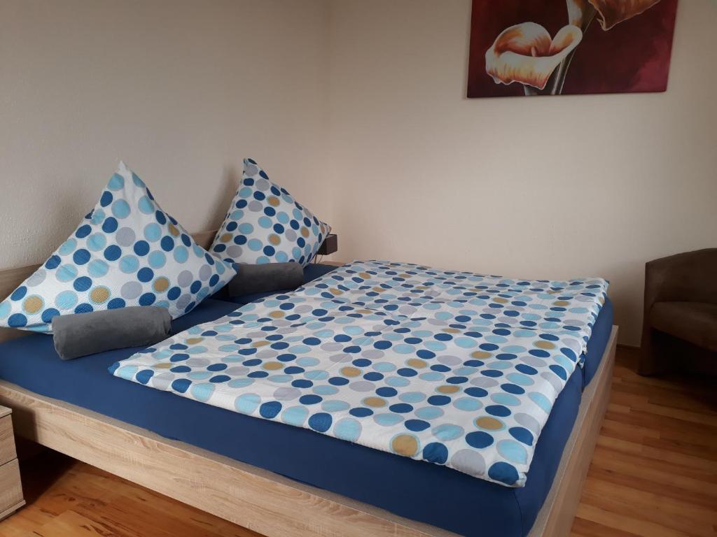 Postel nebo postele na pokoji v ubytování Ferienwohnung SimBlick