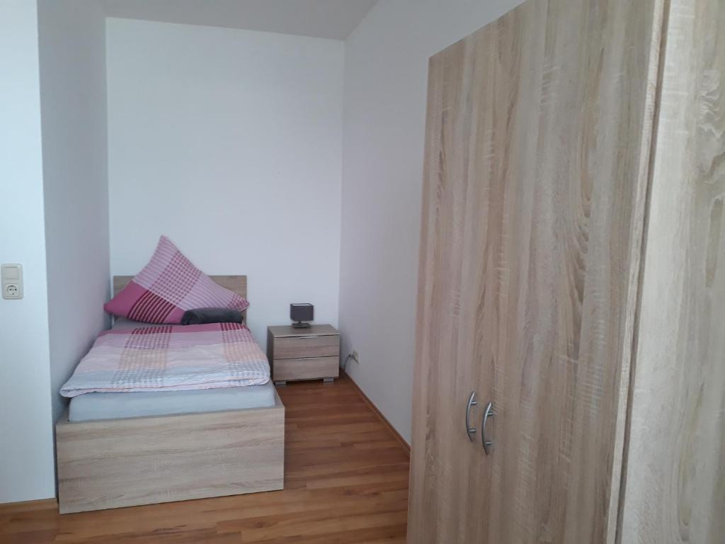 Postel nebo postele na pokoji v ubytování Ferienwohnung SimBlick