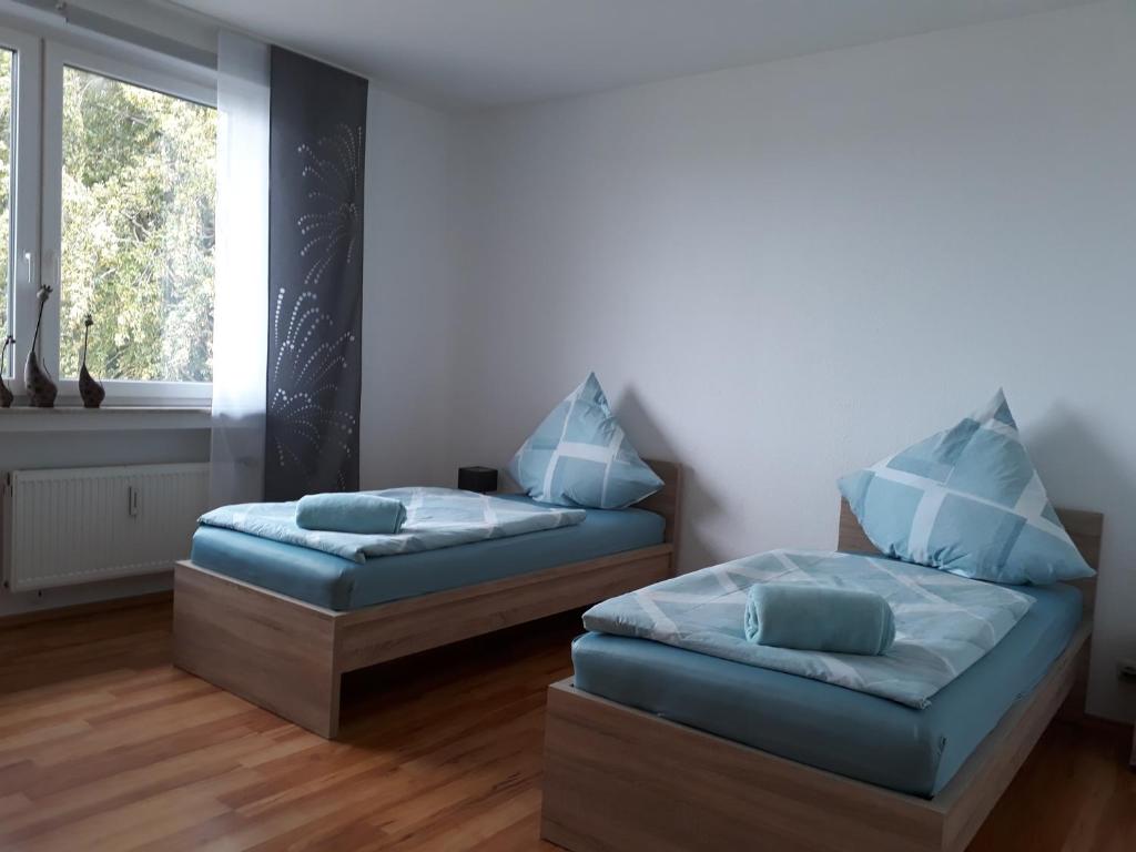 Postel nebo postele na pokoji v ubytování Ferienwohnung SimBlick
