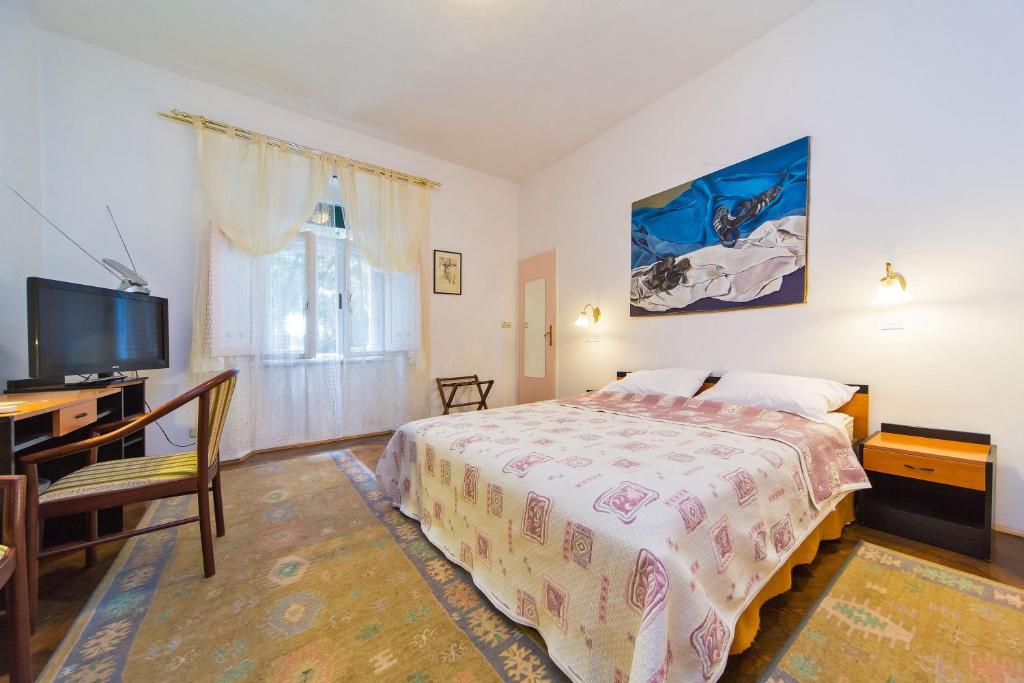 Кровать или кровати в номере B&B Sesame Inn