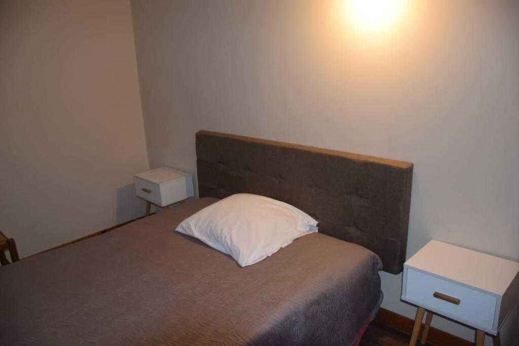 Postel nebo postele na pokoji v ubytování Hôtel Résidence Champerret