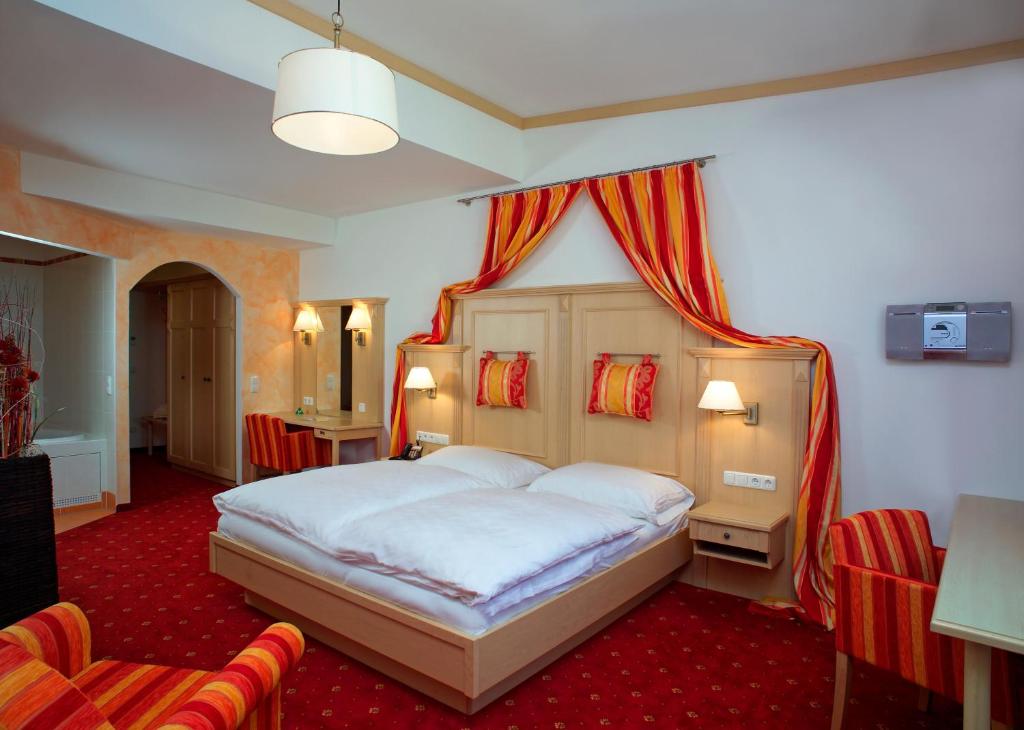 Postel nebo postele na pokoji v ubytování Hotel Restaurant Wallner I contactless check-in