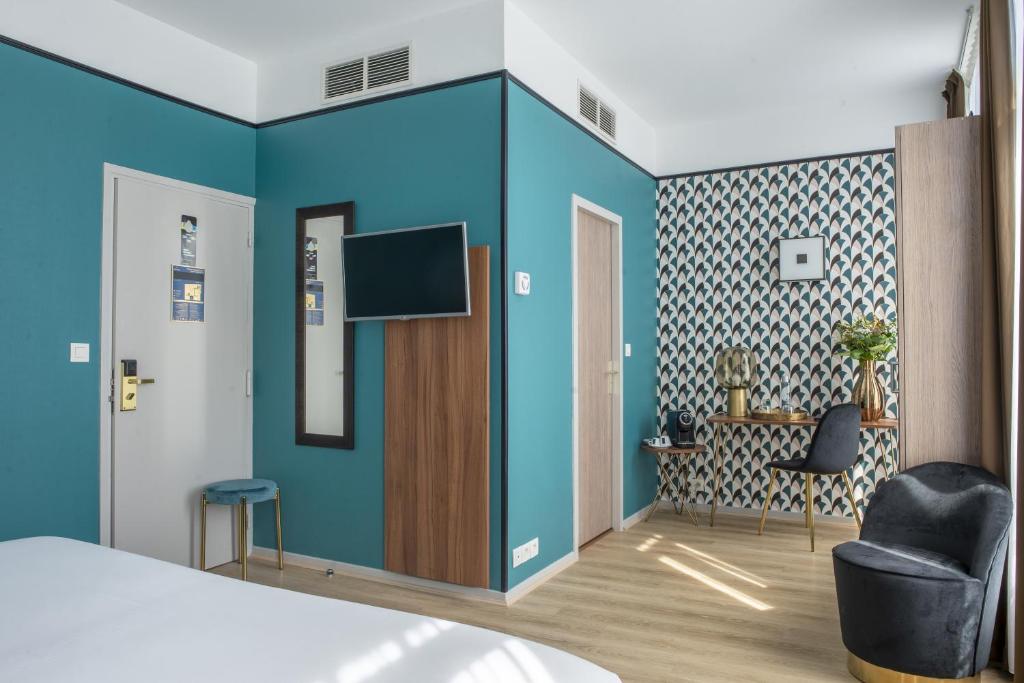 Postel nebo postele na pokoji v ubytování Hôtel Le Bristol