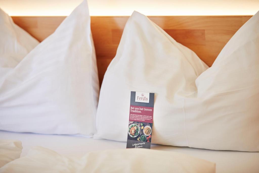 Postel nebo postele na pokoji v ubytování I AM HOTEL Graz-Seiersberg