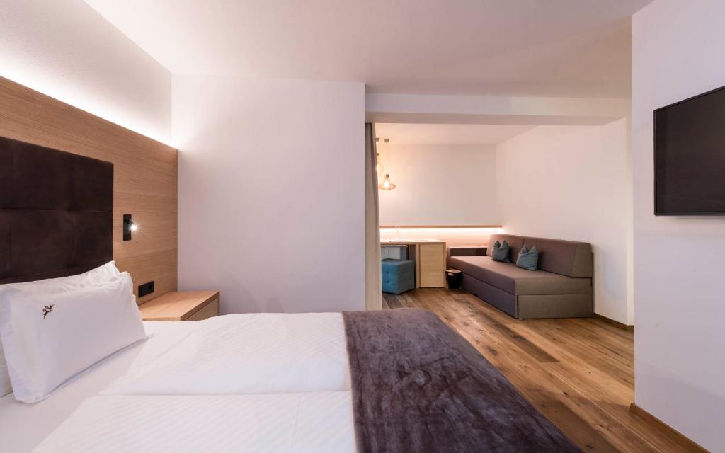 Postel nebo postele na pokoji v ubytování Villa Tony - Small Romantic Hotel