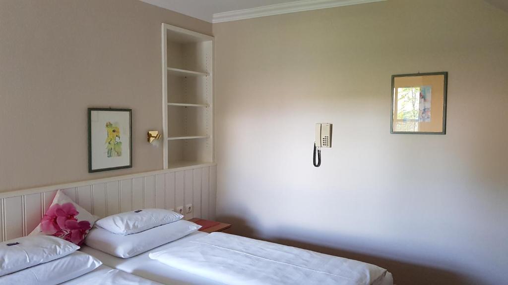 Postel nebo postele na pokoji v ubytování Hotel - Garni Stabauer