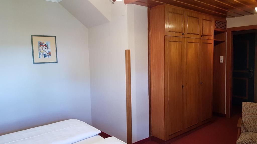 Postel nebo postele na pokoji v ubytování Hotel - Garni Stabauer