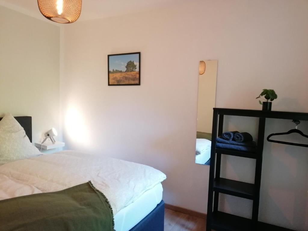 Postel nebo postele na pokoji v ubytování Ferienhaus Fasanennest