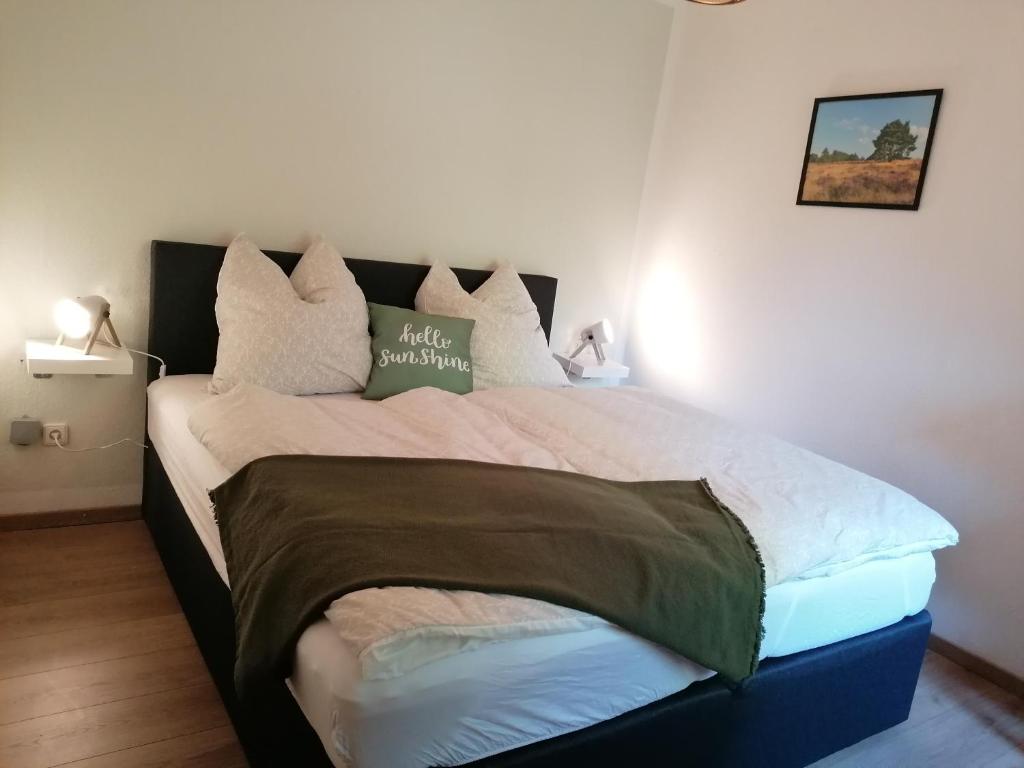 Postel nebo postele na pokoji v ubytování Ferienhaus Fasanennest