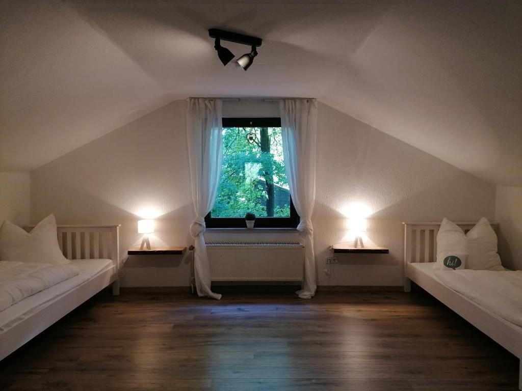 Postel nebo postele na pokoji v ubytování Ferienhaus Fasanennest
