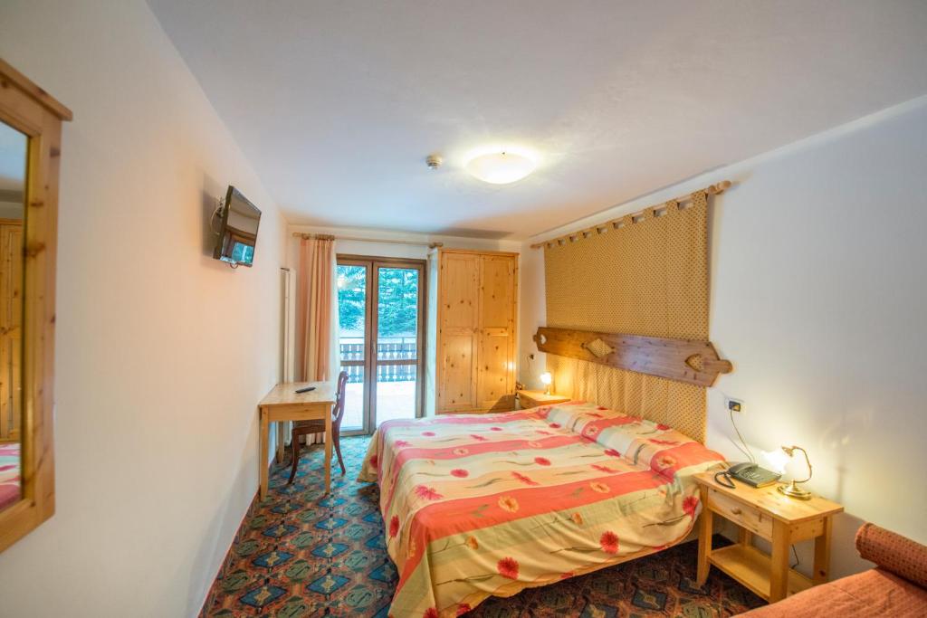 Postel nebo postele na pokoji v ubytování IHR Hotel Villa Emma