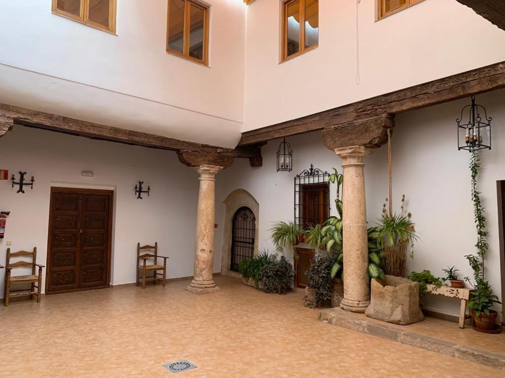 a large room with columns and a ceiling at Mirador Sierra De Alcaraz in Alcaraz