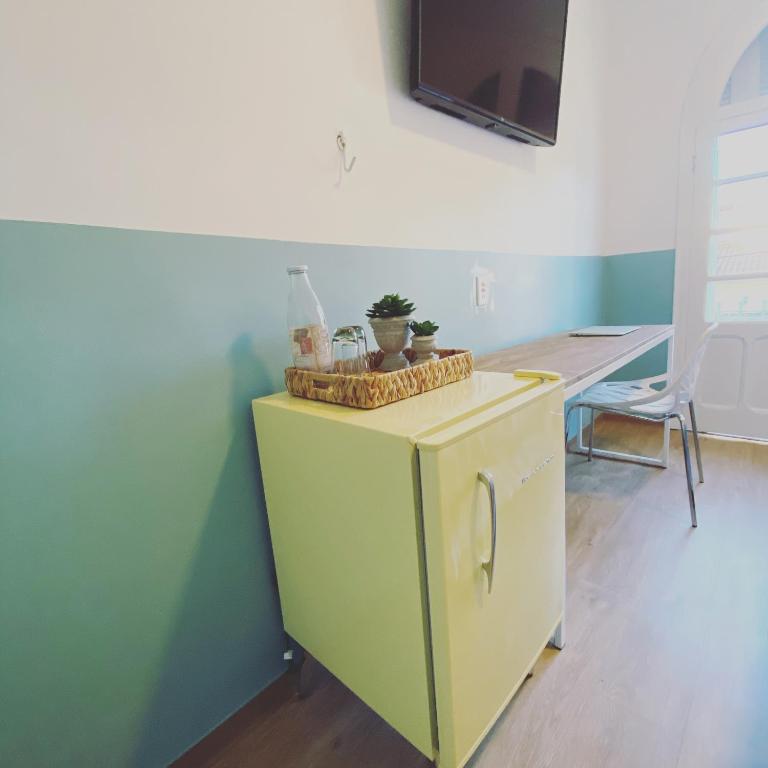 TV a/nebo společenská místnost v ubytování Angatu Hostel