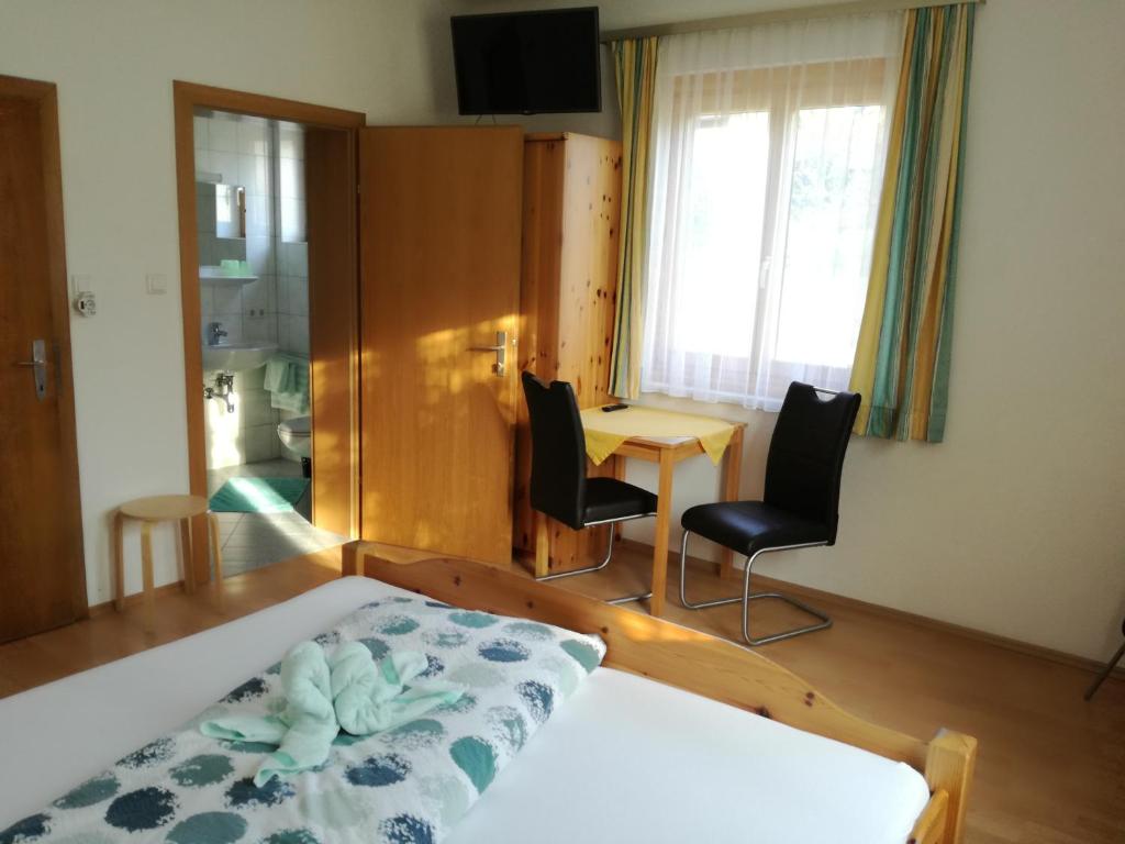 Postel nebo postele na pokoji v ubytování Lasserhof