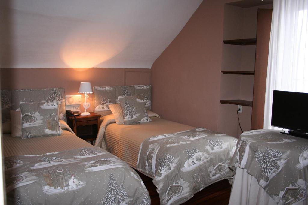 Postel nebo postele na pokoji v ubytování Hotel Boutique Balaitus