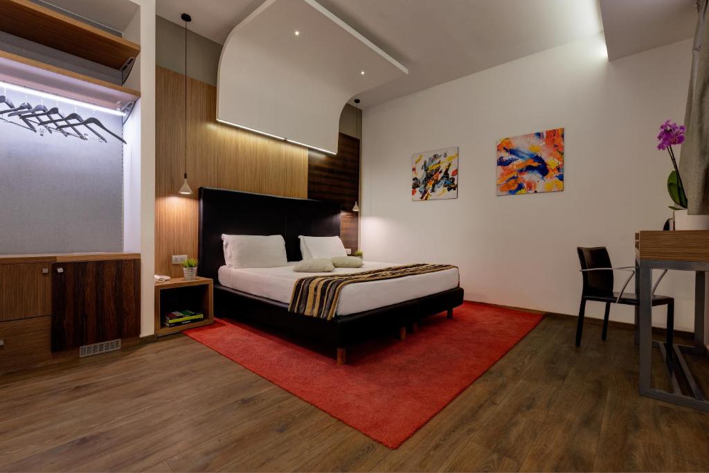 Postel nebo postele na pokoji v ubytování Hotel Rinascimento - Gruppo Trevi Hotels